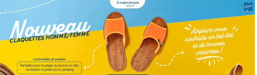 claquette noir sur fond bleu et jaune
